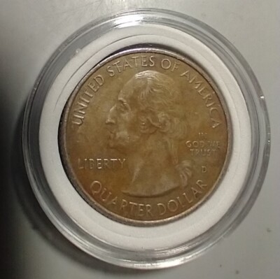 2017 quarter missing clad layer error — one side shows bright copper-red color instead of normal silver-gray